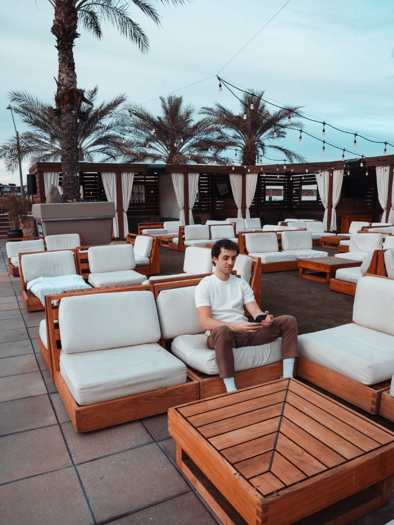 Men's production — rooftop lounge portrait